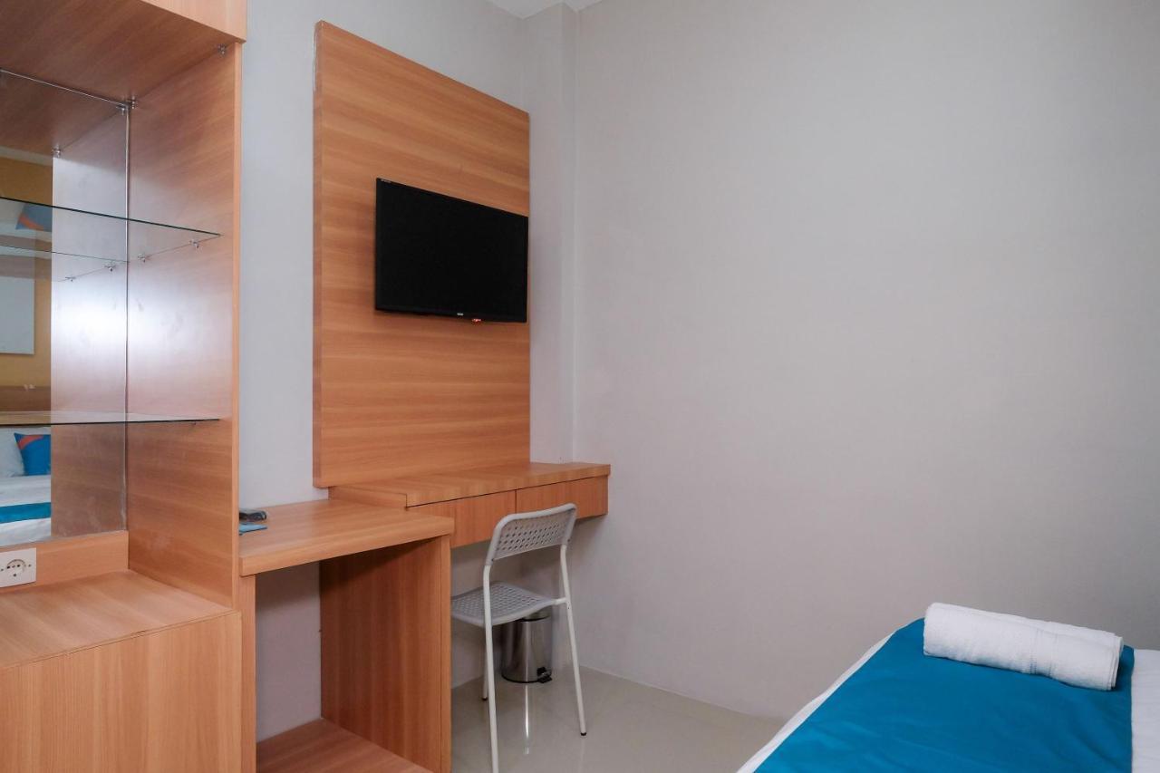 Sans Hotel Tiga Putri Semarang By Reddoorz Экстерьер фото
